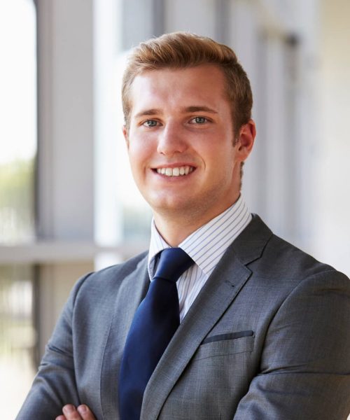 portrait-of-a-young-smiling-professional-man-arms-2021-08-26-16-13-59-utc-1-e1656565117637.jpg